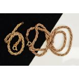A 9CT GOLD ROPE TWIST BI-COLOUR NECKLACE AND BRACELET, both designed as a yellow gold rope twist