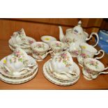 ROYAL ALBERT 'MOSS ROSE' TEAWARES, comprising teapot (seconds), sugar bowl, milk jug, six cups (five