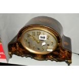 A WOODEN VENEERED FOOTED MANTLE CLOCK, painted with floral and chinoserie decoration, silvered