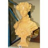 A PLASTER BUST OF GIRL, painted in soft orange and yellow