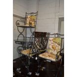 A CIRCULAR BLACK PAINTED WROUGHT IRON TABLE with a glass top, together with four matching chairs (