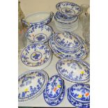 MINTON 'DELFT' PATTERN DINNERWARES, to include tureens, meat platters, soup bowls and plates, (chips