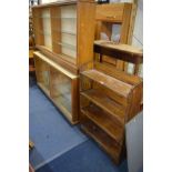 A STAINED PINE OPEN BOOKCASE, together with two oak sliding glazed bookcases (3)