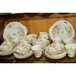 ROYAL DOULTON 'APPLE BLOSSOM' TEASET, H4899, comprising two cake plates, milk jug, sugar bowl, ten