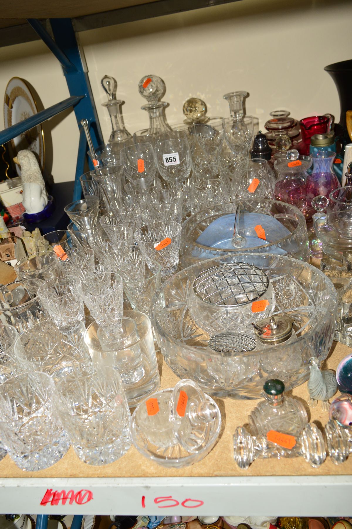 A COLLECTION OF GLASSWARE to include un-named cut glass wine glasses, brandy glasses, sherry