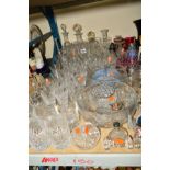 A COLLECTION OF GLASSWARE to include un-named cut glass wine glasses, brandy glasses, sherry