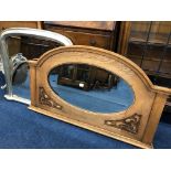 A GOLDEN OAK OVERMANTEL MIRROR together with a modern wall mirror (2)