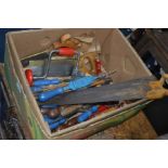 A BOX CONTAINING VARIOUS VINTAGE HAND TOOLS, to include a quantity of maples chisels, saws, manual