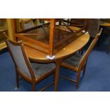 A G PLAN TEAK EXTENDING DINING TABLE AND FOUR CHAIRS, (5)