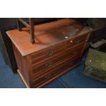 AN EDWARDIAN STAINED PINE CHEST OF TWO SHORT AND TWO LONG DRAWERS, width 108cm x depth 49cm x height