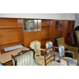 A PAIR OF MID 20TH CENTURY TEAK DOUBLE GLAZED DOOR BOOKCASES, together with a teak wall unit and a