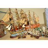 TEN MODELS OF SHIPS ON STANDS, HMS Victory, height 43cm x length 50cm, H M S Bounty height 34cm x