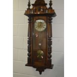 A VICTORIAN VIENNA WALNUT REGULATOR WALL CLOCK, the 18'' dial with Roman numerals, height 130cm