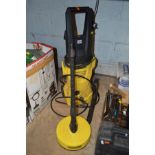 A KARCHER K2 PRESSURE WASHER with three attachments