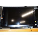 A PANASONIC 32'' LCD TV (one remote)
