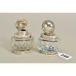 A PAIR OF GEORGE V SILVER MOUNTED OVAL CUT GLASS INKWELLS, makers William Hutton & Sons Ltd,