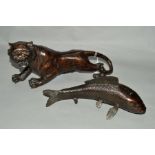 A BRONZED SNARLING TIGER IMPRINTED STRIPE PATTERN THROUGHOUT THE BODY, 32cm long x 16cm height, with