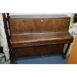 A SCOTCHER WALNUT UPRIGHT PIANO (sd)