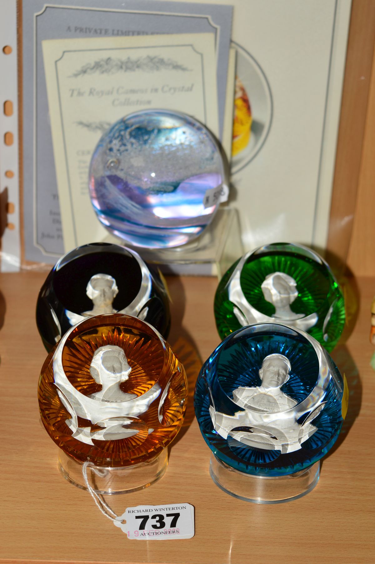 A SET OF FOUR BACCARAT PAPERWEIGHTS BY JOHN PINCHES, LONDON, from 'The Royal Cameos in Crystal