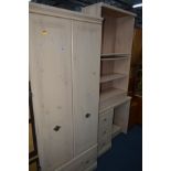 A MODERN TWO PIECE BEDROOM SUITE, comprising of a double door wardrobe above a single long drawer,