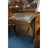 AN EDWARDIAN MAHOGANY DAVENPORT with one cupboard end with three dummy drawer and three drawers to