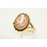A 9CT CAMEO RING, the oval cameo depicting a dancing female within a rope twist surround, with 9ct