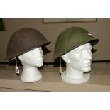 TWO EXAMPLES OF BRITISH ARMY MKIV STEEL HELMETS, as used in the 50's/60's etc, both have liners