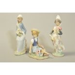 THREE LLADRO FIGURES, 'With Wild Flowers' No1287, by Francisco Catala, height 16cm (petals missing