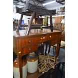 A MAHOGANY SIDE TABLE with one long drawer over two short and standing on cabriole legs with pad