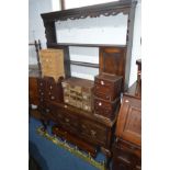 A LATE 19TH/EARLY 20TH CENTURY OAK AND BANDED DRESSER, with triple drawers with geometric detail