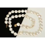A CULTURED PEARL NECKLACE, designed as a single row of disc shape cultured pearls to the circular