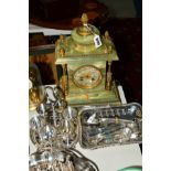 A LATE 19TH/EARLY 20TH CENTURY FRENCH ONYX MANTLE CLOCK, having bevelled glass door, gilt metal