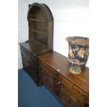 A REPRODUCTION CARVED OAK SIDEBOARD with two drawers and double cupboard doors, width 128cm x