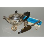 A GEORGE V SILVER OVAL PART REEDED TEA POT, domed cover, ebony fitments, maker's Goldsmiths &