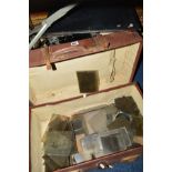 A BLACK METAL DEED BOX, (key), with a suitcase containing a collection of glass slides (magic