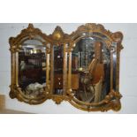 A REPRODUCTION FOLIATE GILT RESIN OVERMANTEL MIRROR, 155cm x 118cm