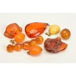 A SELECTION OF AMBER JEWELLERY, to include a pair of natural amber bead drops (no fitting), a pear