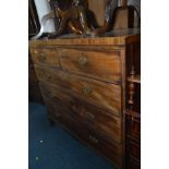 A GEORGIAN MAHOGANY CHEST OF TWO SHORT OVER THREE LONG DRAWERS with boxwood stringing to the top,
