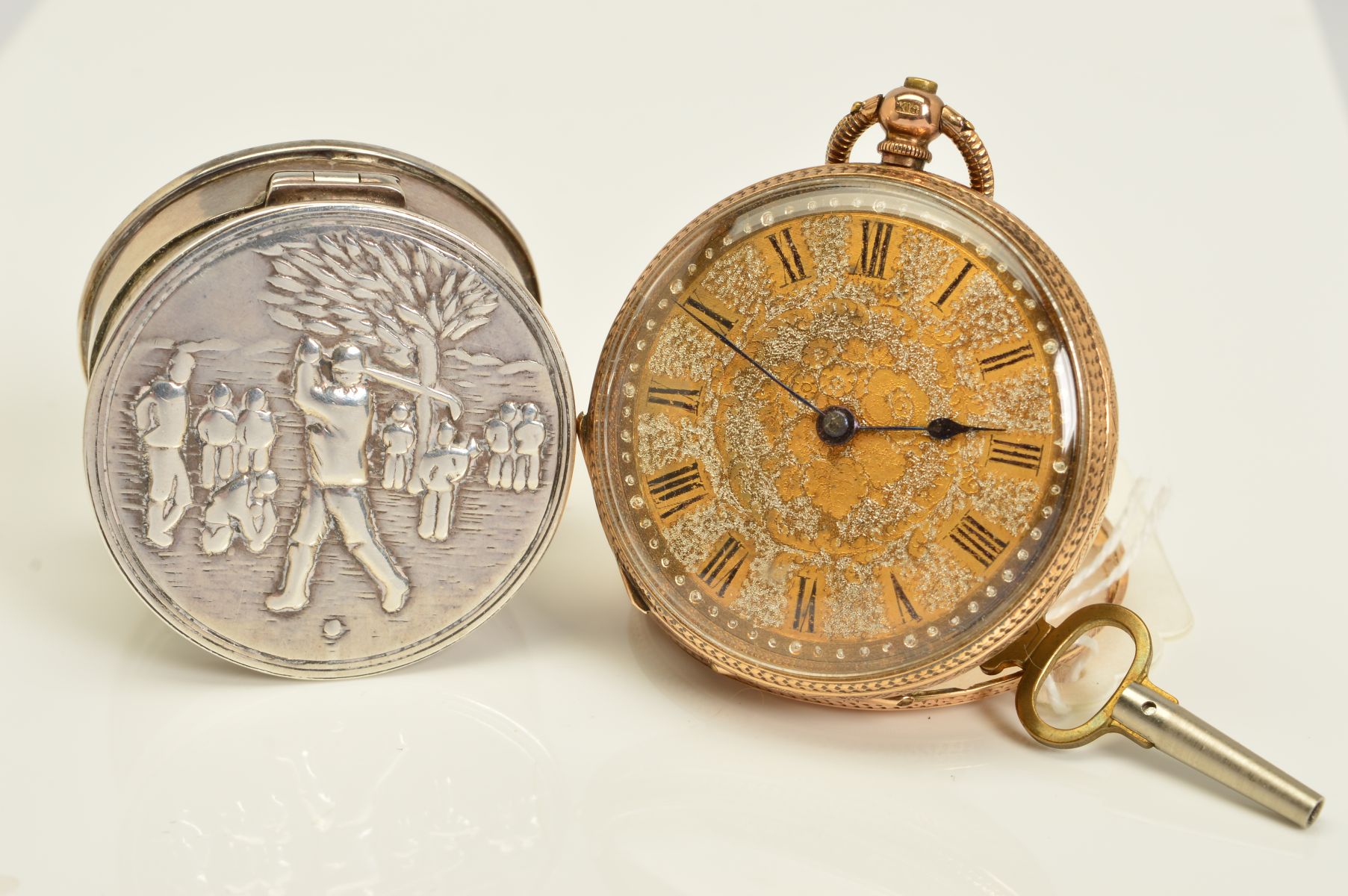 AN EARLY 20TH CENTURY GOLD POCKET WATCH AND A PILL BOX, the open face pocket watch with black