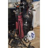 A BLACK PING GOLF BAG, another golf bag, containing Ping and various other golf clubs together