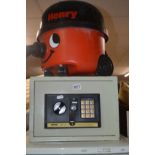 A NUTOOL SF10 ELECTRONIC DIGITAL SAFE (key), together with a Henry hoover (missing attachment) (2)