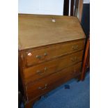 AN EDWARDIAN MAHOGANY AND BANDED FALL FRONT BUREAU with three drawers, width 92cm x depth 46cm x