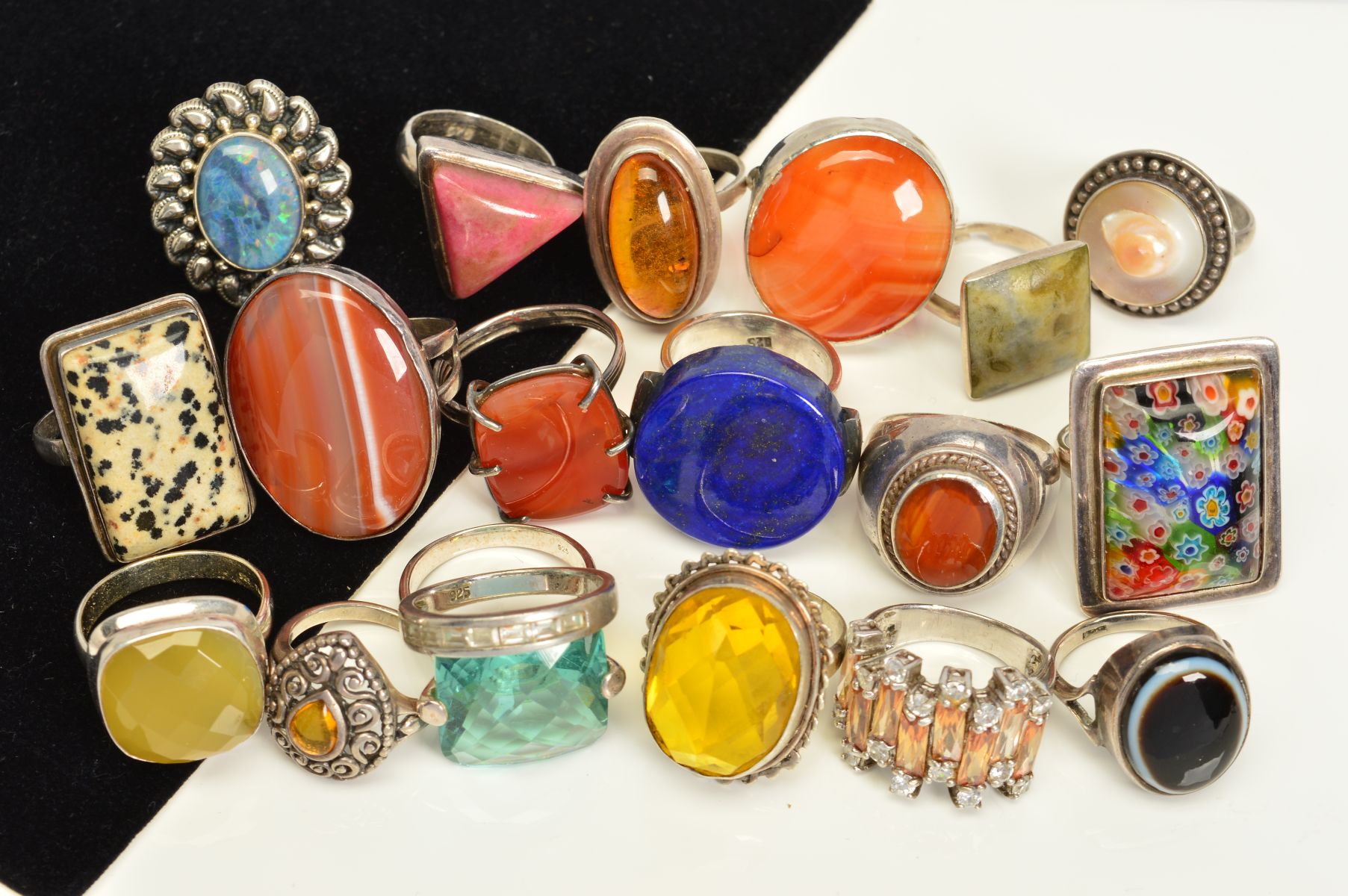 A SELECTION OF NINETEEN MAINLY GEM SET SILVER AND WHITE METAL RINGS, to include rings set with an