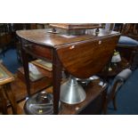 A GEORGE III MAHOGANY OVAL TOPPED PEMBROKE TABLE with two drawers on square tapering legs and