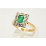 AN EMERALD AND DIAMOND CLUSTER RING, designed as a central emerald cut emerald within a brilliant