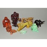A SELECTION OF CARVED GEM AND NON GEM FIGURES, to include a small carved amber seated figure with