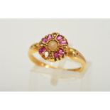 AN EARLY 20TH CENTURY 18CT GOLD GEM RING, designed as a central split pearl within a diamond and
