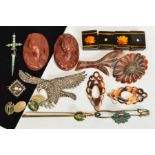 A SELECTION OF JEWELLERY, to include a marcasite eagle brooch, a square pietra dura floral brooch, a