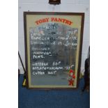 A PINE FRAMED TOBY PANTRY ADVERTISING SPECIALS MIRROR, 70cm x 101cm
