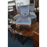 A GEORGIAN OAK OVAL DROP LEAF DINING TABLE with a single drawer, open width 139cm x closed width